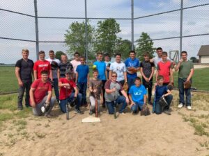 Campers playing baseball