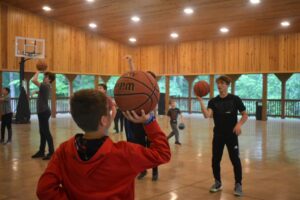 Campers playing basketball